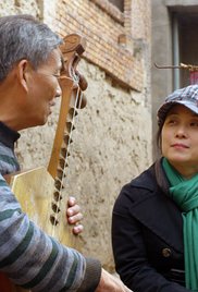 The Music of Strangers afişi