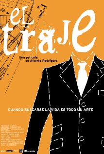 El traje afişi